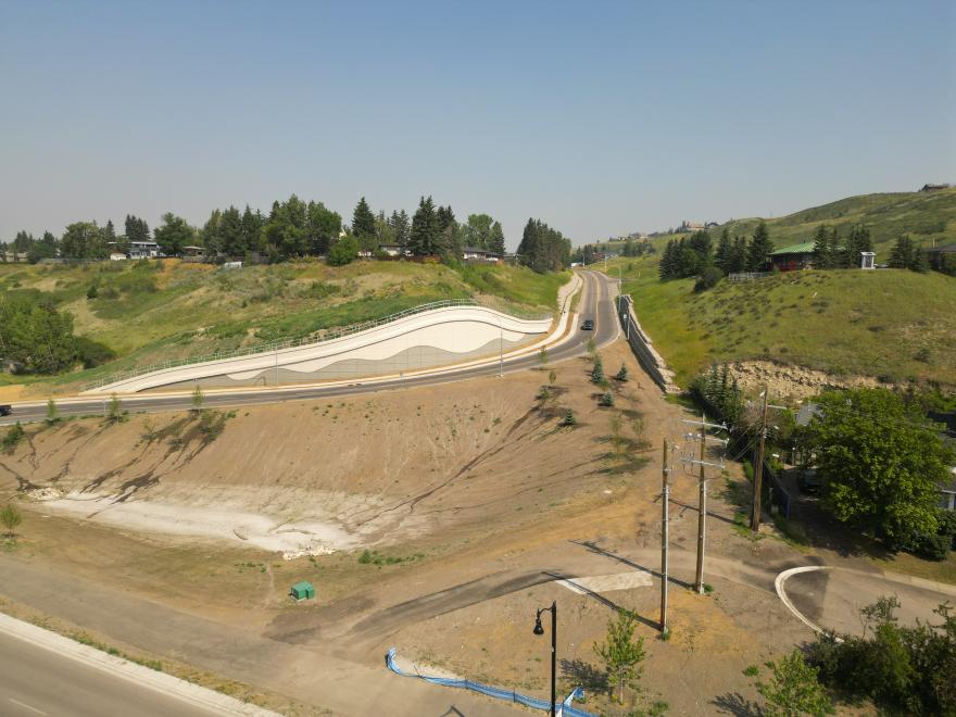 Aerial photo of retaining wall and construction site on Fourth Avenue, Cochrane, Albertaa