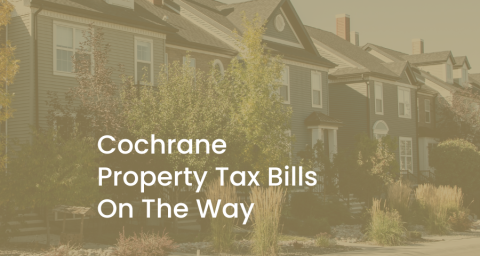 Cochrane property tax bills on their way with homes in the background and text in front